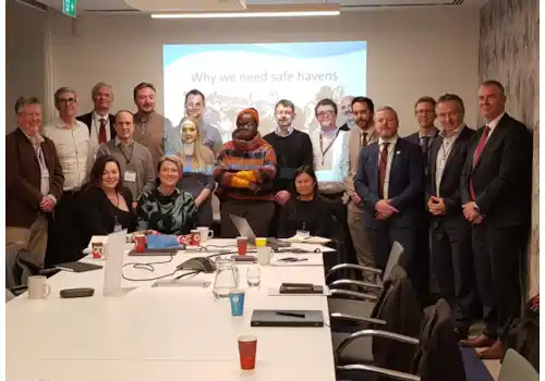 WHO campaigner Rosamund Adoo Kissi-Debrah, centre, with the BESA Health & Wellbeing Group WHO campaigner Rosamund Adoo Kissi-Debrah, centre, with the BESA Health & Wellbeing Group