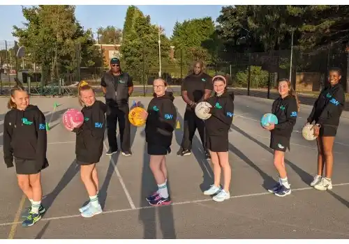 New players at Parkside Junior Netball Club sport their new JSW-branded hoodies in the company of their trainers New players at Parkside Junior Netball Club sport their new JSW-branded hoodies in the company of their trainers