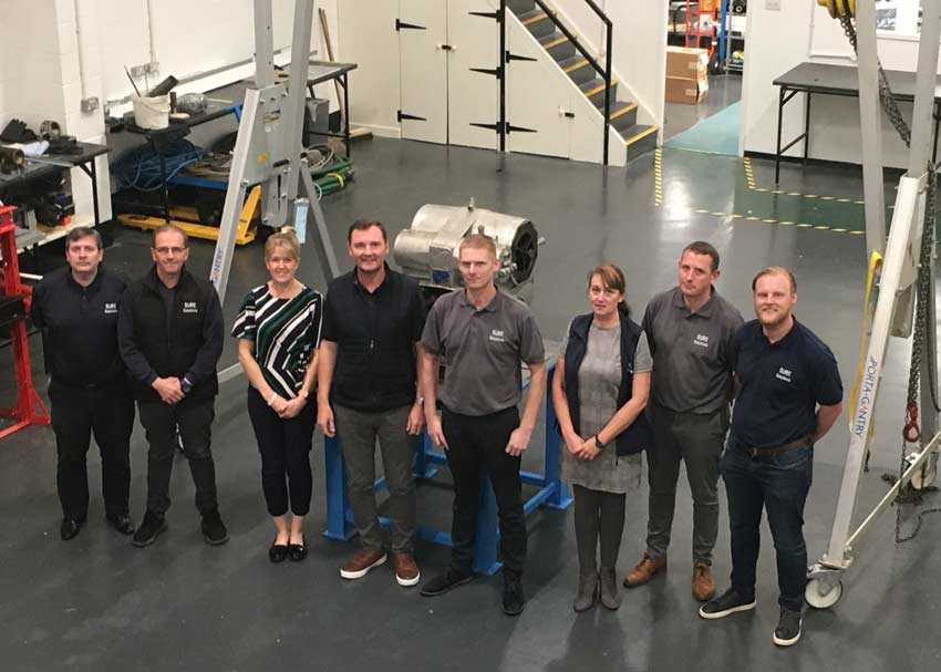 The move to new premises in Birkenhead has given SURE Solutions engineering and storage facilities, in addition to office space. From left, Rob Wharton, John Callan, Bryony Farr, Garry Shaw, Mark Parry, Joanne Kelly, Craig Costall and Craig Shaw