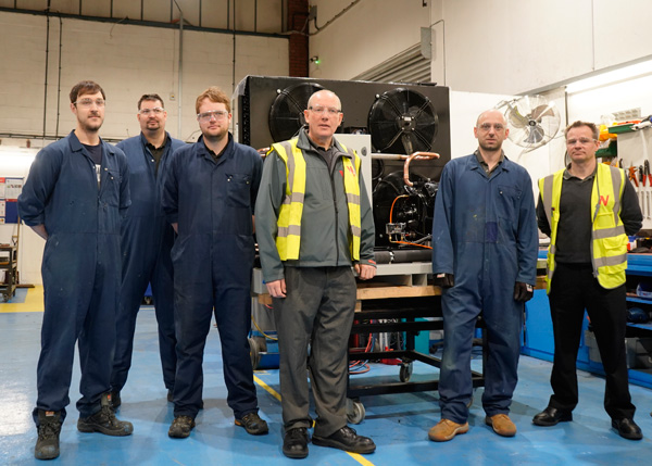 Peter Woods, centre, and John Kilby, right with some members of the Wolseley Custom Build team