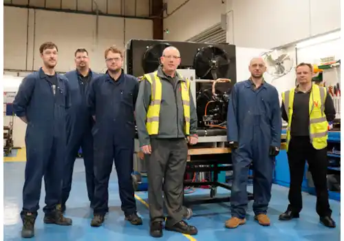 Peter Woods, centre, and John Kilby, right with some members of the Wolseley Custom Build team Peter Woods, centre, and John Kilby, right with some members of the Wolseley Custom Build team