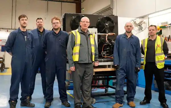 Peter Woods, centre, and John Kilby, right with some members of the Wolseley Custom Build team Peter Woods, centre, and John Kilby, right with some members of the Wolseley Custom Build team