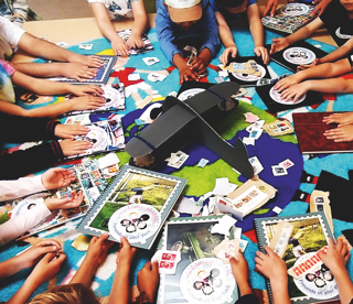 Children playing with stamps