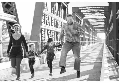Discover the joy of finding family history clues for free - a family run holding hands Discover the joy of finding family history clues for free - a family run holding hands