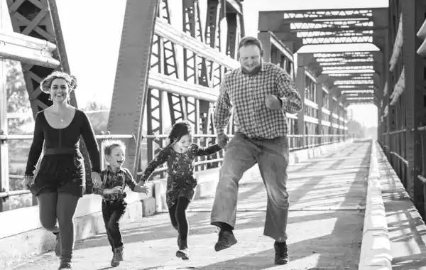 Discover the joy of finding family history clues for free - a family run holding hands Discover the joy of finding family history clues for free - a family run holding hands