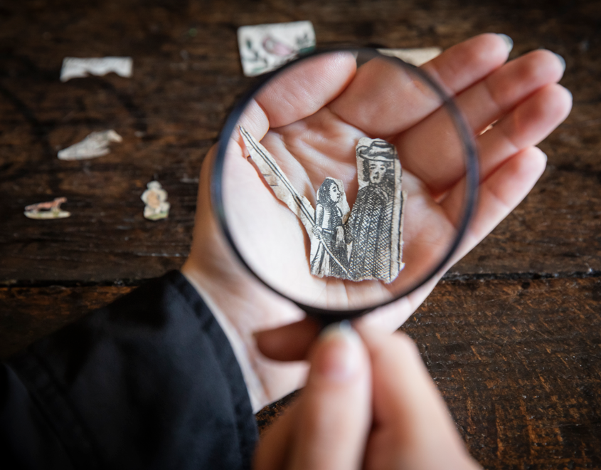 copyright James Dobson National Trust papercut image seen with magnifying glass Sutton House Family Tree UK
